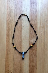Rasta tooth necklace - black
