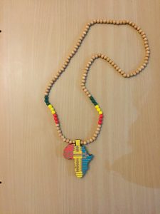 Africa pendant necklace - beige